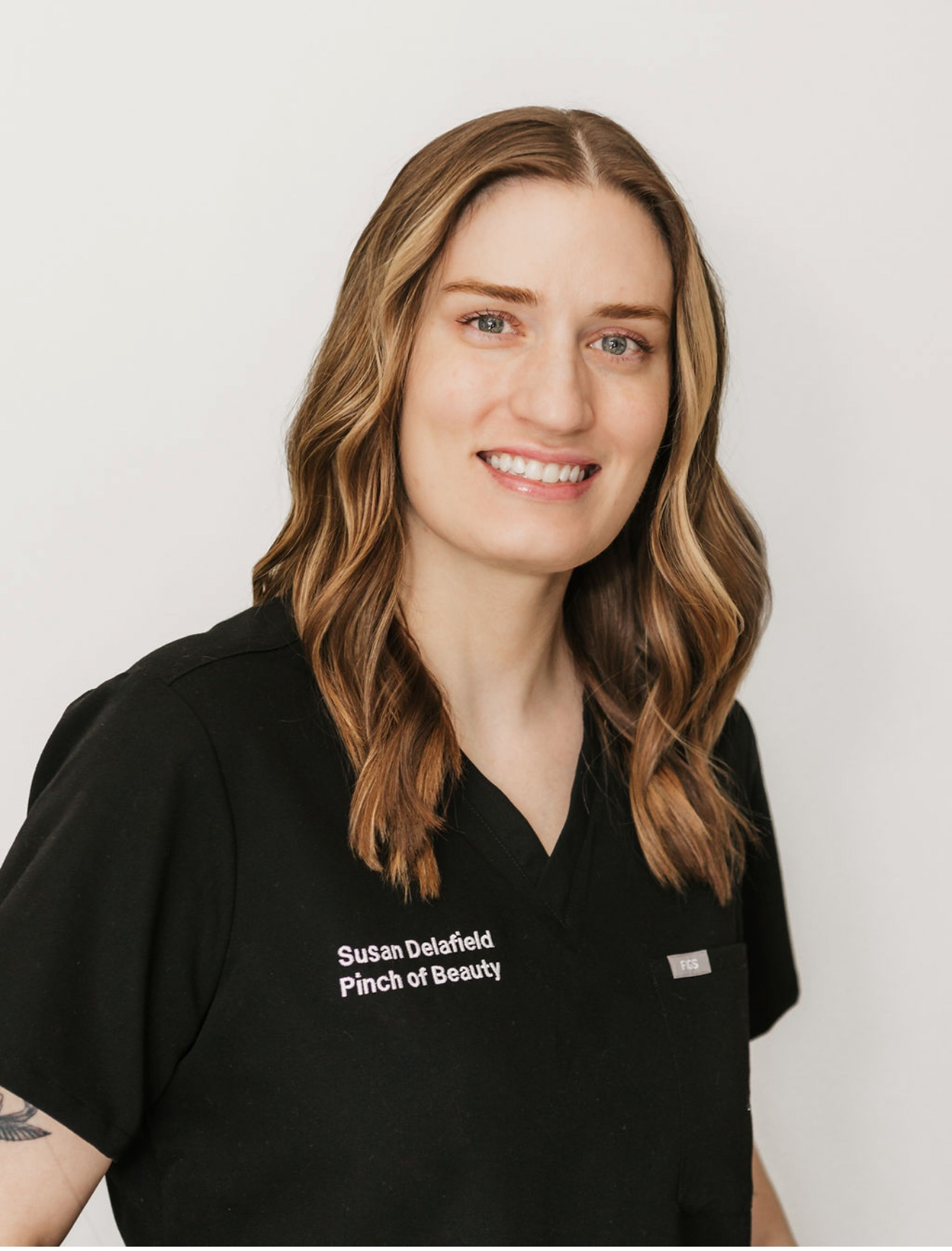 a person smiling for the camera